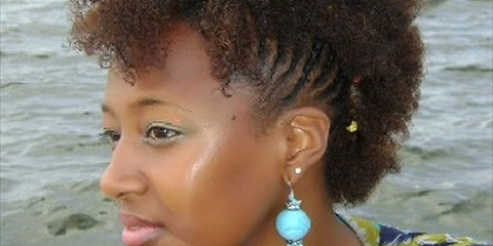 African American woman with natural hairstyle in Fro-hawk